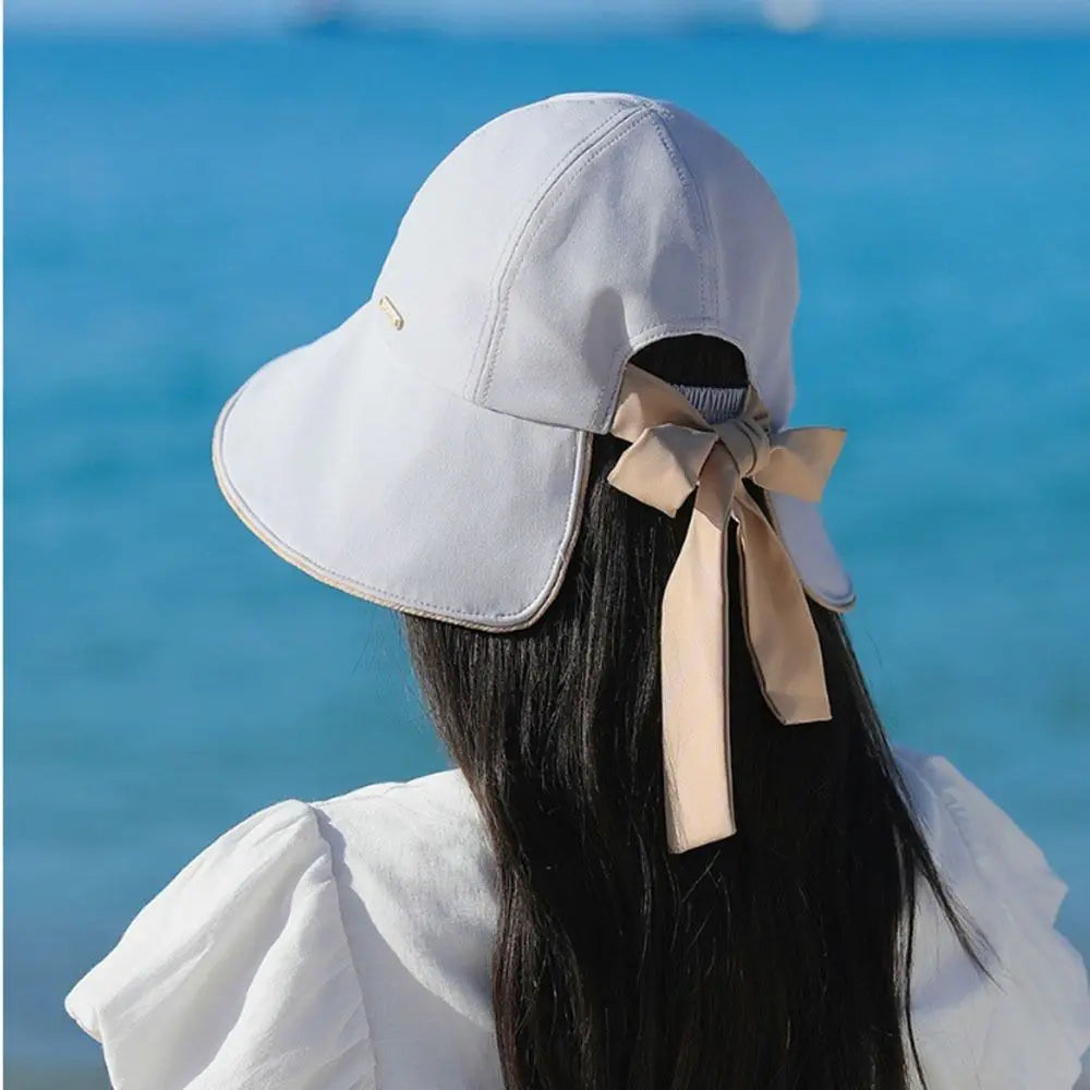 Casual Wide Brim Sun Hat UV Protection Breathable Women Bucket Hat Foldable with Bow Ponytail Hole Summer Beach Hat